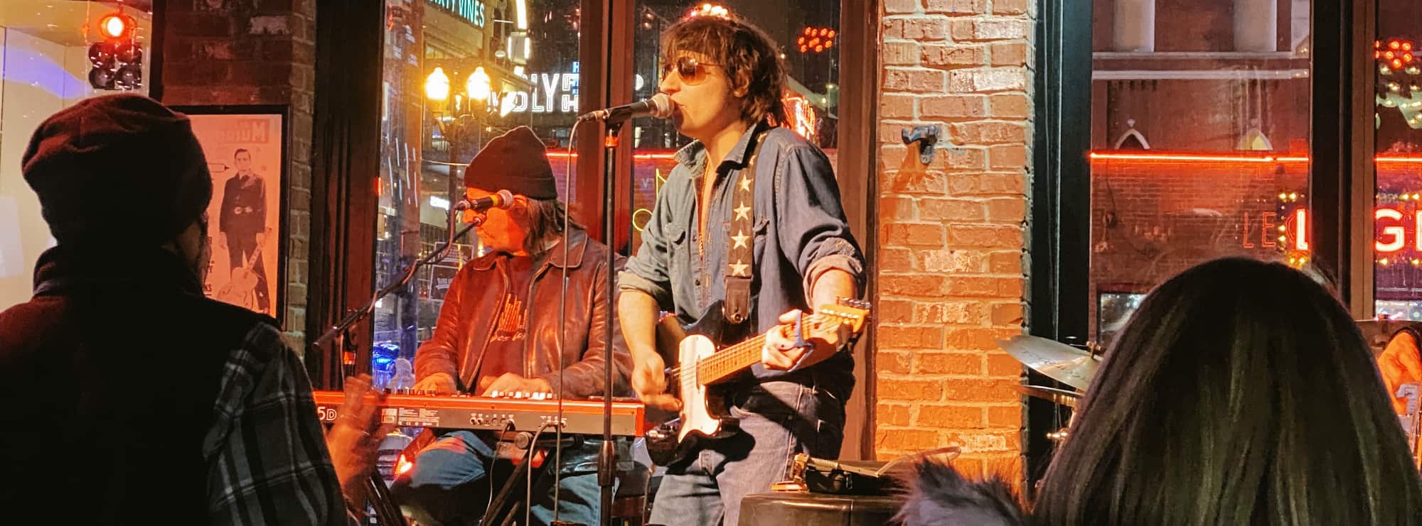 bar singer on guitar in Des Moines