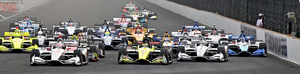 indy cars racing to through the start line Des Moines