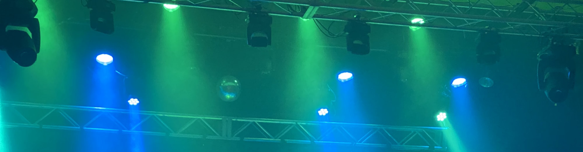 blue and green theater stage lights Des Moines